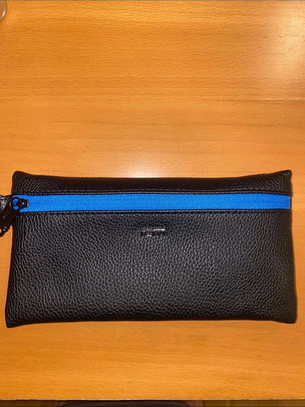 TUMI Woman’s Cosmetic Black and Blue Bag